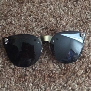 Black oversized sunglasses with skull detail
